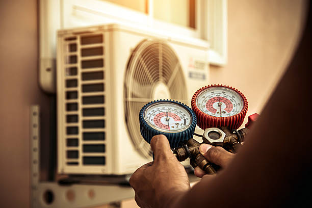 Professional Air Conditioning Service technician working in Morrow, AR